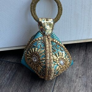 Fortune Cookie Purse
Beaded Zip Snap Closure
Gold Sequin Wristlet Clutch
Bag